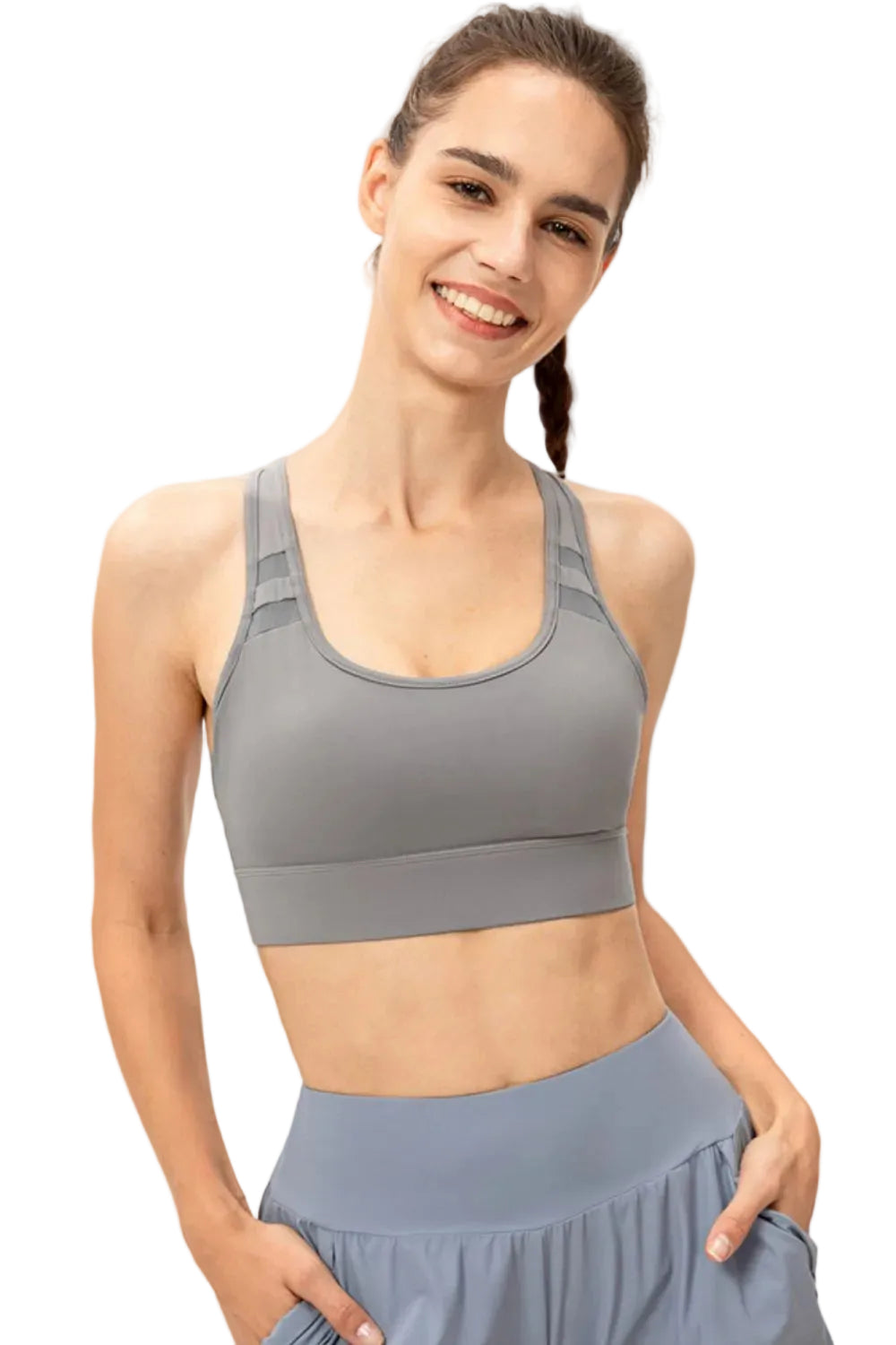 Women's scoop neck longline sports bra with mesh strap panels and built-in padding for yoga and Pilates